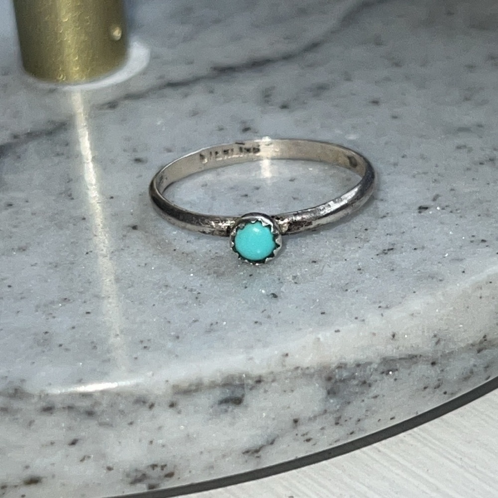Turquoise Navajo sterling silver ring marked “L.M.” & “STERLING”